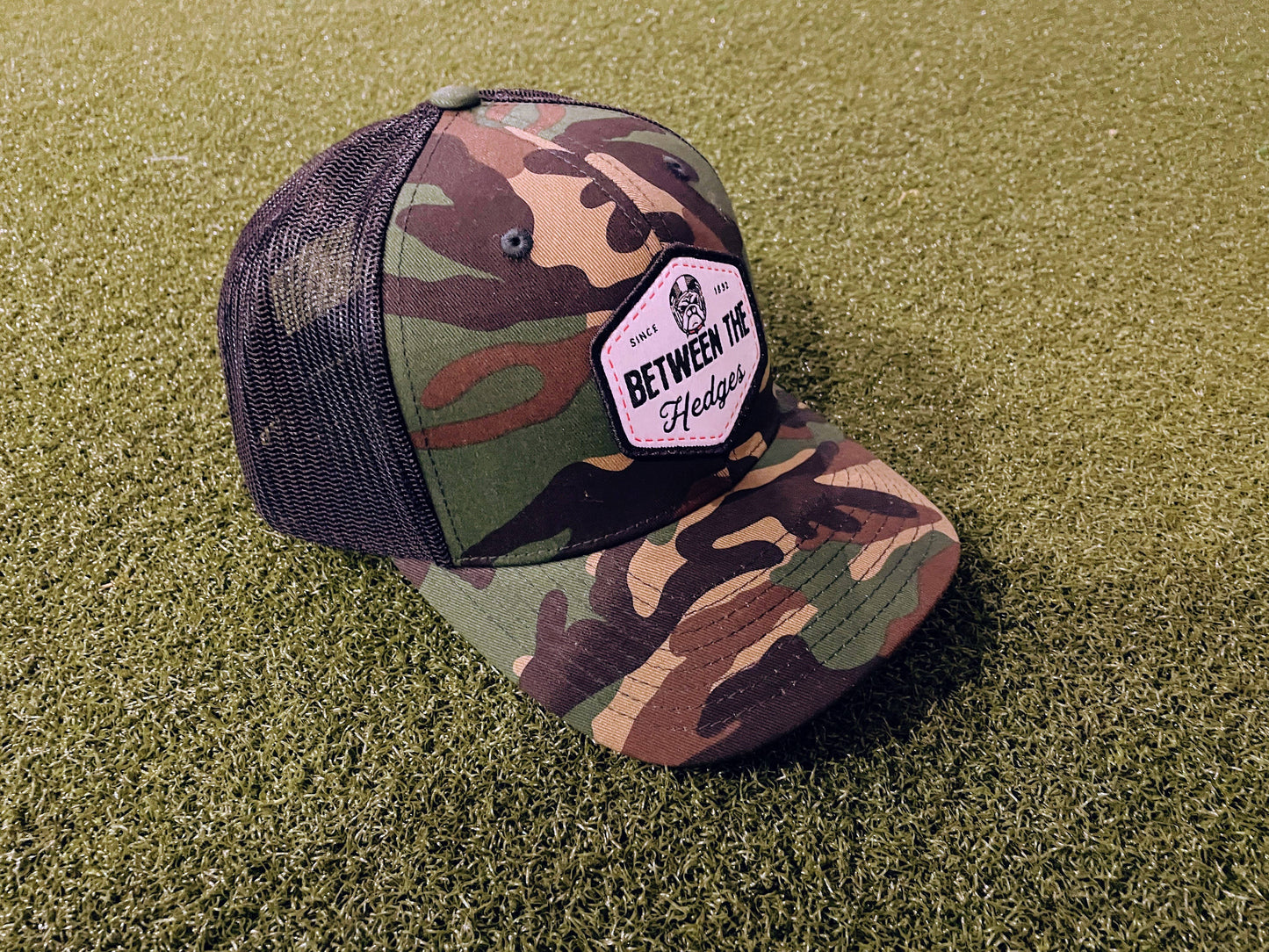 Camo & Black "Between The Hedges" Trucker Hat