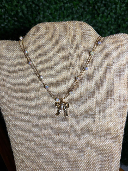 White Crystal Disco Ball Necklace with Gold Bow